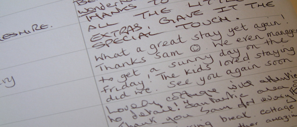 Close up view of the guestbook at Gors-lwyd Cottage Llithfaen