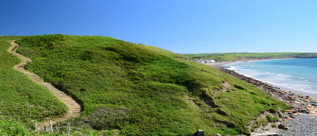 View of Aberdaron from the Wales Coast Path. Path from Aberdaron to Porth Meudwy. Bardsea, Llyn Peninsula, North Wales