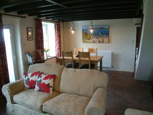 A view of the lounge and dining room at Gors-lwyd Cottage Llithfaen Llyn Peninsula