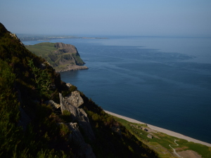 View of the beach at Nant Gwrtheyrn from the cliffs by the road