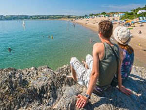 Couple overlooking Abersoch beach Llyn Peninsula North Wales