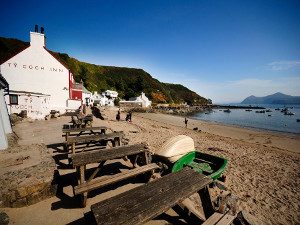 View of the beach and Ty Coch Inn Porthdinllaen Llyn Peninsula Morfa Nefyn North Wales