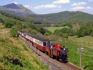 Steam train at the Vale of Ffestiniog narrow gauge track North Wales