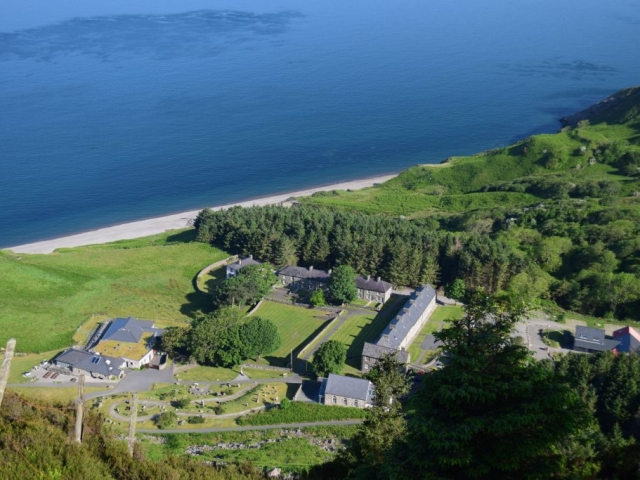 View of Nant Gwrtheryn Llithfaen from the cliff-top road Welsh language learning centre and beach Llyn Peninsula North Wales