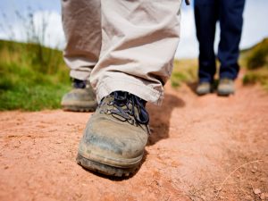 A walker in walking boots