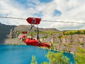 Person on the zip line at Zip World Blaenau Ffestiniog North Wales