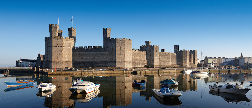 View of Caernarfon Castle from the harbour North Wales