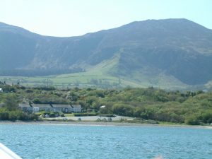 View of Trefor beach from the sea Llyn Peninsula North Wales boating fishing