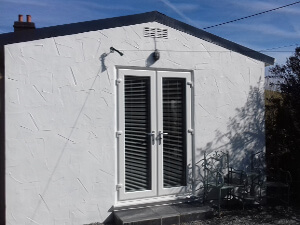 External view of Gors-lwyd games room showing french doors