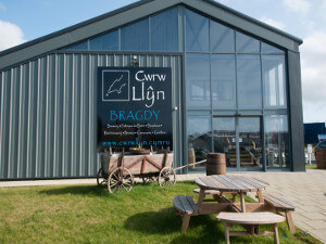 View of Cwrw Llyn brewery in Nefyn. Showing the brewery, picnic tables