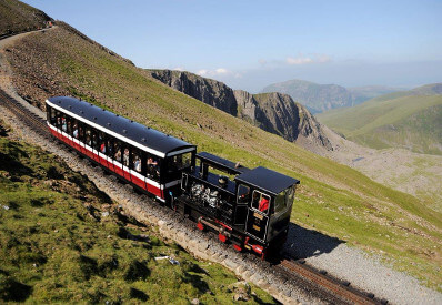 Photo of a diesel train up Snowdon Mountain Railway. Diesel service to the summit of snowdon