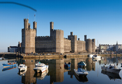 View of Caernarfon Castle from the harbour North Wales